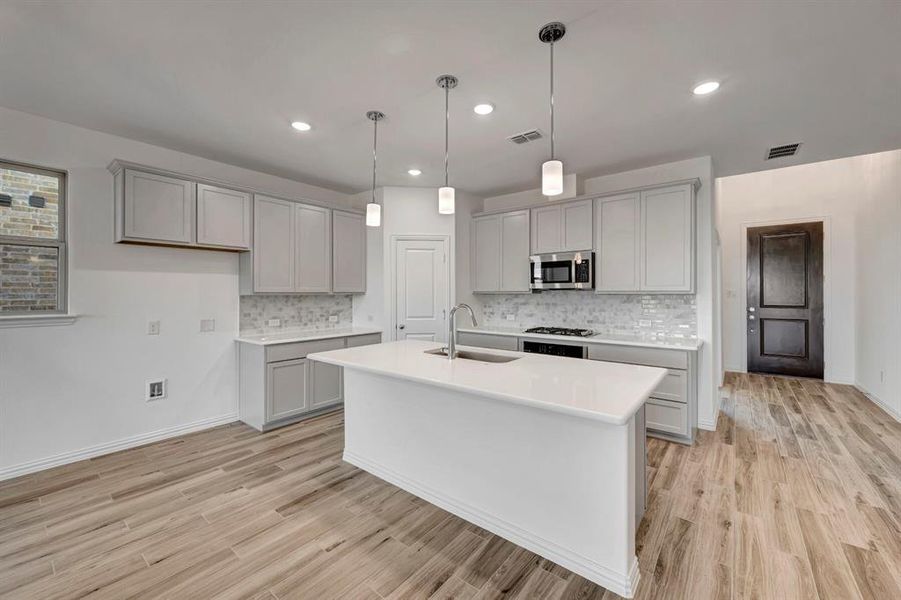Furnished interior view inside a new home in Lilyana, Celina (Image 6).