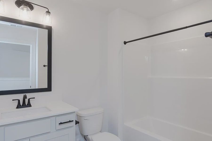 Representative furnished interior of a home built from the 1808 Townhome by Adams Homes in Parkstone Place Townhomes, Roebuck (Image 6). Representative furnished interior of a home built from the 1808 Townhome by Adams Homes in Parkstone Place Townhomes, Roebuck (Image 6).