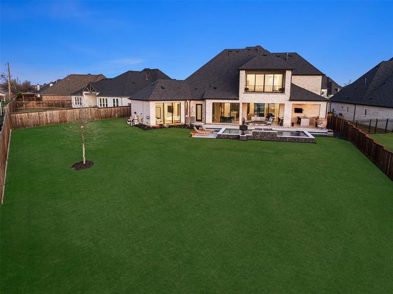 Situated on over half an acre, this exceptional waterfront property offers breathtaking panoramic views of Lake Lewisville. The expansive homesite provides a rare combination of space, privacy, and direct access to the natural beauty of the shoreline, creating the perfect setting to enjoy stunning sunsets and lakeside living in The Tribute.