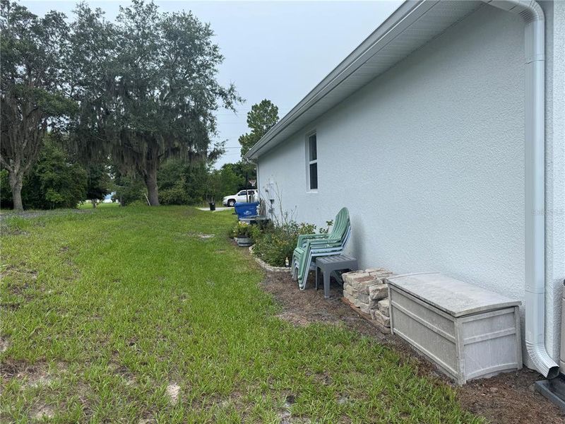 Front exterior of a new home in , Osteen, FL, highlighting curb appeal (Image 21).