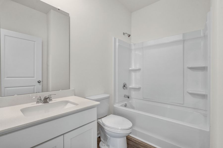 Representative furnished interior of a home built from the Europa by Starlight Homes in Andalusia, Loris (Image 12).