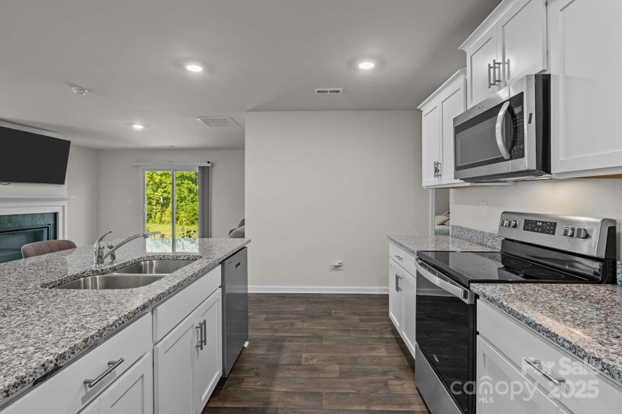 Furnished interior view inside a new home in Mills at Long Creek, Dallas (Image 8).