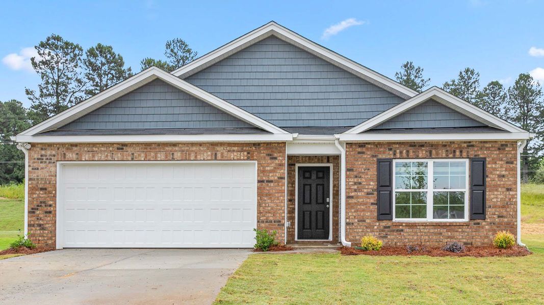 Front exterior of a new home in Greystone North, Stoneville, NC, highlighting curb appeal (Image 1). Front exterior of a new home in Greystone North, Stoneville, NC, highlighting curb appeal (Image 1).