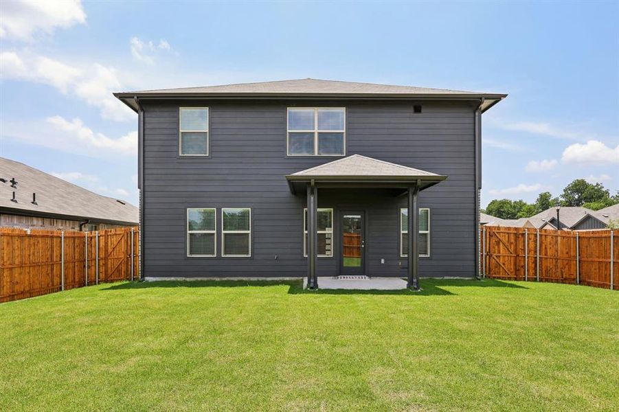 Front exterior of a new home in Westmoor, Sherman, TX, highlighting curb appeal (Image 19).