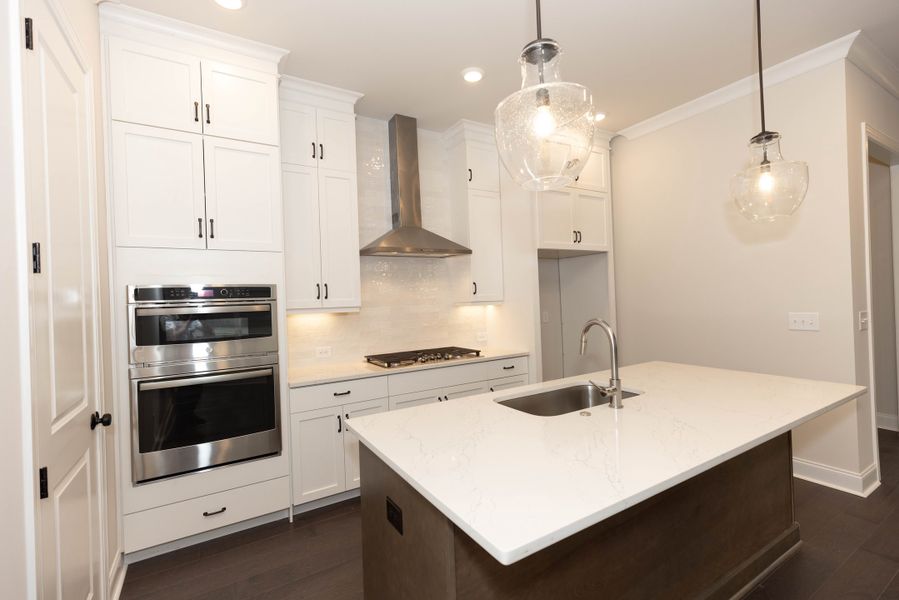 Representative furnished interior of a home built from the The Tensley by The Providence Group in Waterhaven, Cumming (Image 8).
