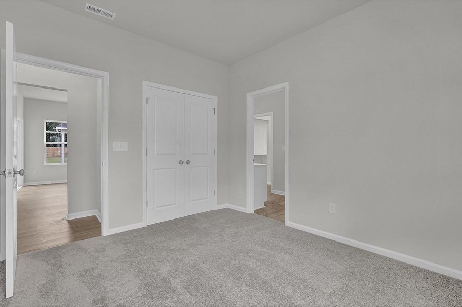 Spacious, unfurnished interior of a new home in River Tide Farms, Bolivia (Image 22).