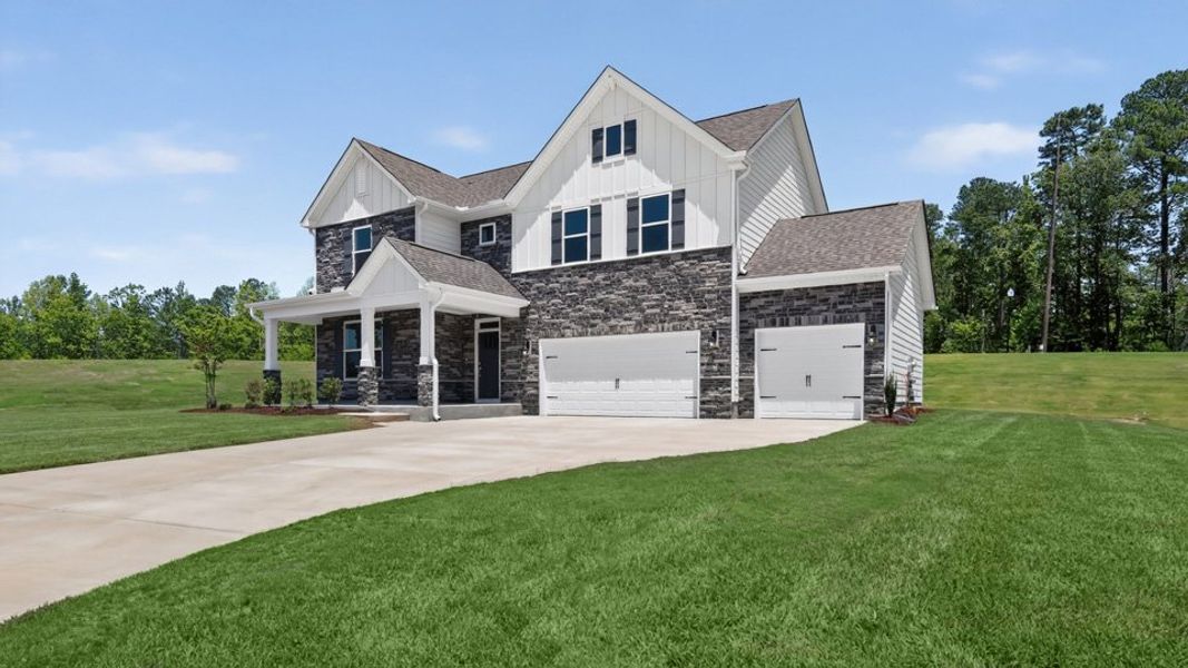 Representative exterior photo of a completed home built from the Hartwell by D.R. Horton in The Manors at Winston Pointe, Clayton, NC (Image 23).