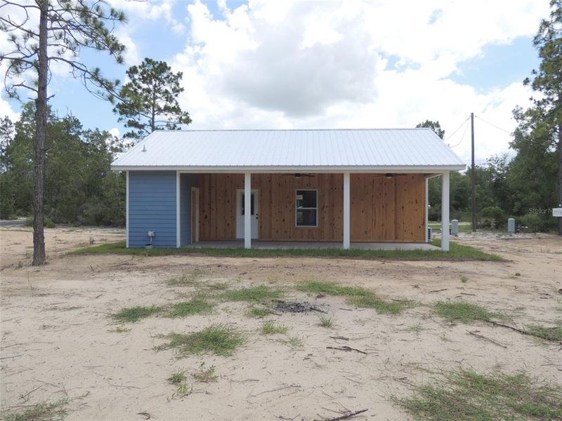 Exterior details and patio area of a home in , Williston (Image 16).