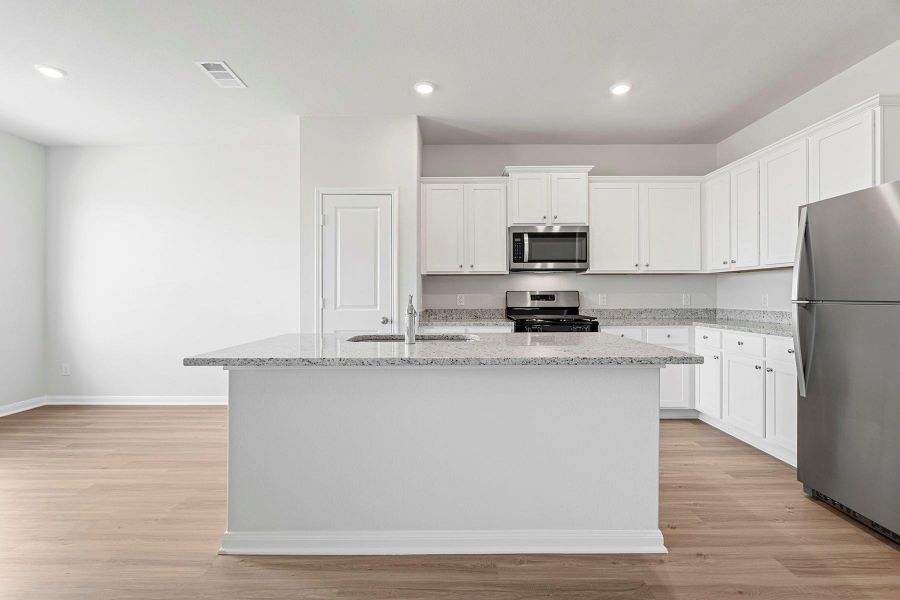 Furnished interior view inside a new home in Emberly, Beasley (Image 4).