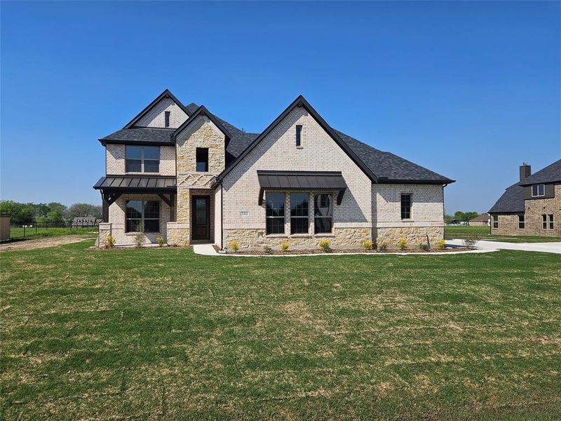 Front exterior of a home in the Trails of Trenton community, located in Trenton, TX (Image 9). Front exterior of a home in the Trails of Trenton community, located in Trenton, TX (Image 9).