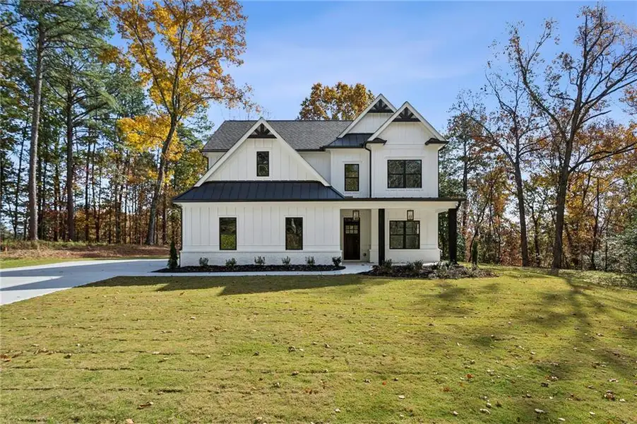 Front exterior of a new home in , Marietta, GA, highlighting curb appeal (Image 2). Front exterior of a new home in , Marietta, GA, highlighting curb appeal (Image 2).