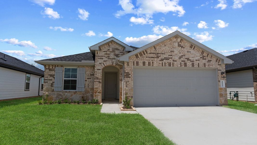Front exterior of a new home in Tamarron, Fulshear, TX, highlighting curb appeal (Image 1). Front exterior of a new home in Tamarron, Fulshear, TX, highlighting curb appeal (Image 1).