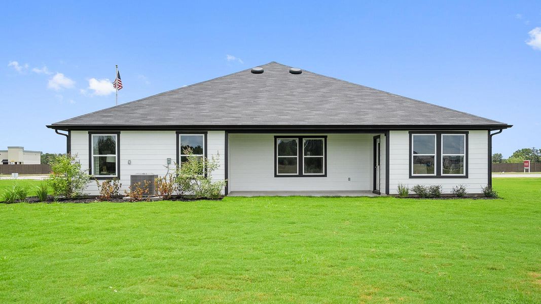 Exterior details and patio area of a home in Railhead, Cedar Creek (Image 4).