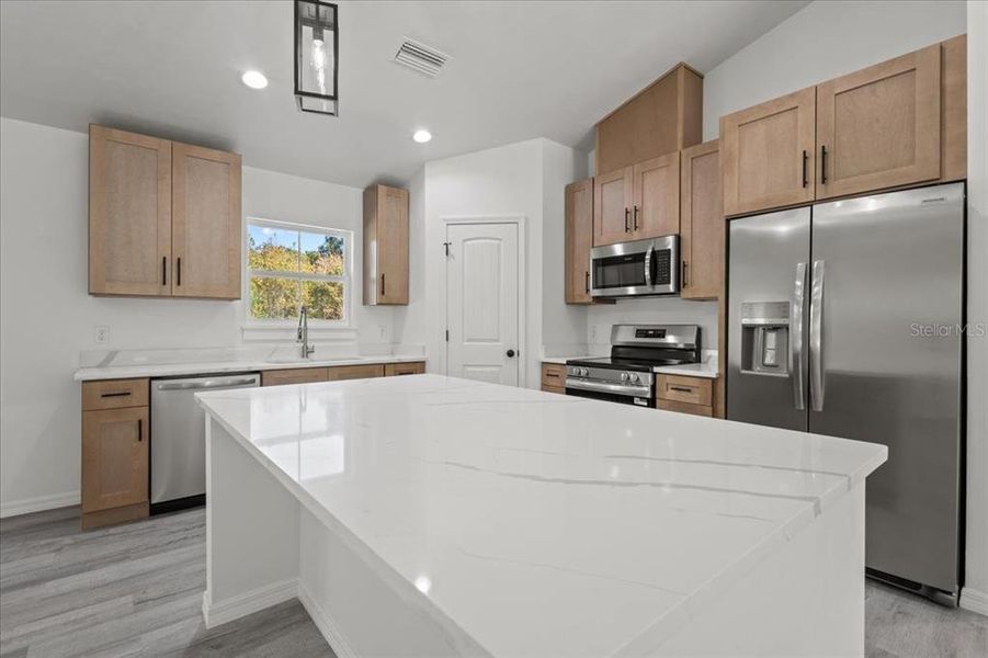 Furnished interior view inside a new home in , Bell (Image 10).