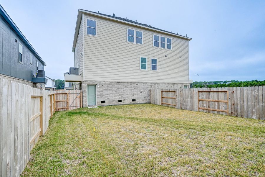 Exterior details and patio area of a home in Townsen Landing, Humble (Image 22). Exterior details and patio area of a home in Townsen Landing, Humble (Image 22).