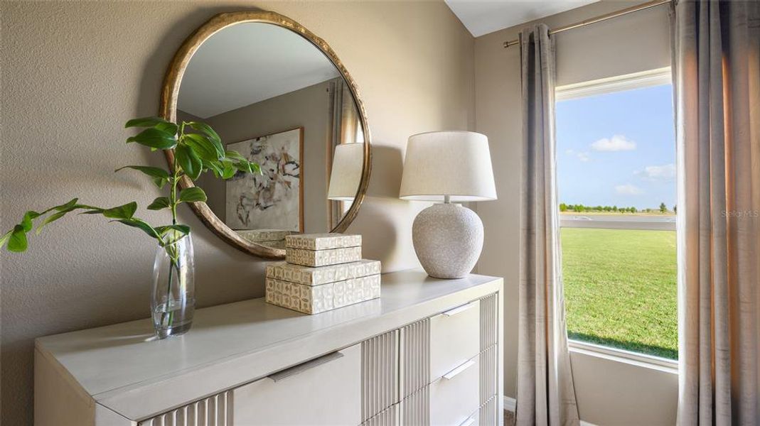 Furnished interior view inside a new home in Scenic Terrace, Haines City (Image 7).