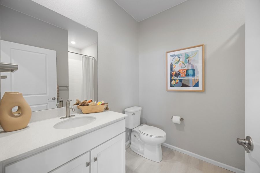 Representative furnished interior of a home built from the 2504 by Risewell Homes in Harvest Crossing, Aurora (Image 13).