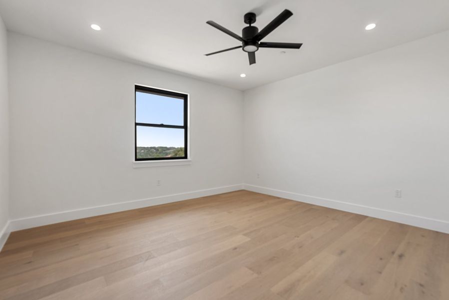 Spacious, unfurnished interior of a new home in Milky Way at River Place, Austin (Image 24).