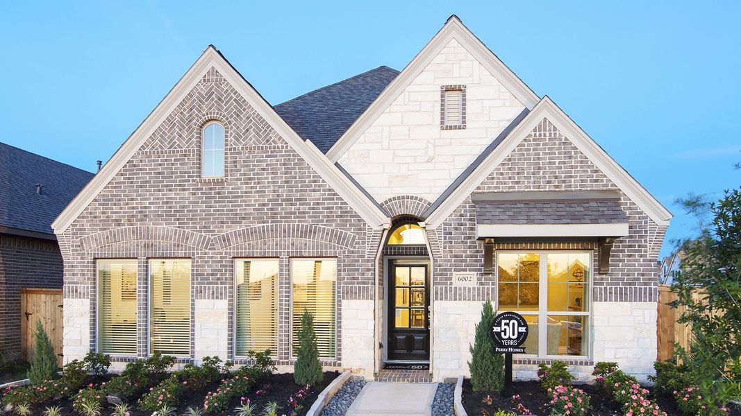 Front exterior of a new home in Briggs Ranch, San Antonio, TX, highlighting curb appeal (Image 20).