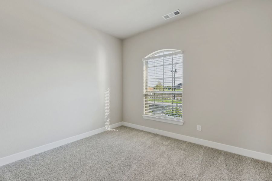 Representative unfurnished interior of a home built from the Windcrest by Chesmar Homes in Talia, Mesquite (Image 15).