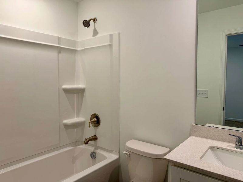 Bath 2 - Stylish finishes and dramatic contrast throughout.