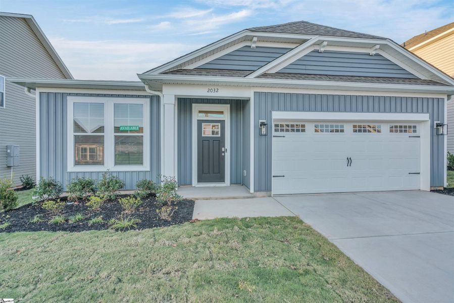 Front exterior of a new home in Halton Oaks, Spartanburg, SC, highlighting curb appeal (Image 18). Front exterior of a new home in Halton Oaks, Spartanburg, SC, highlighting curb appeal (Image 18).