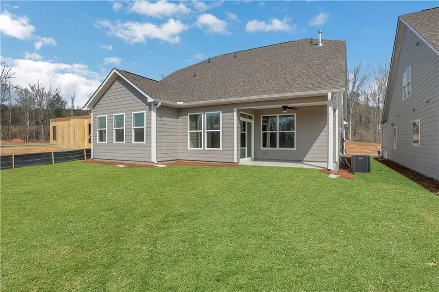 Exterior details and patio area of a home in Marble Tree, Ball Ground (Image 3).
