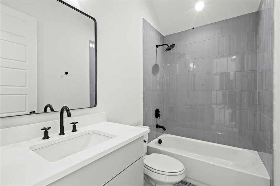 Full bathroom featuring  shower combination and vanity