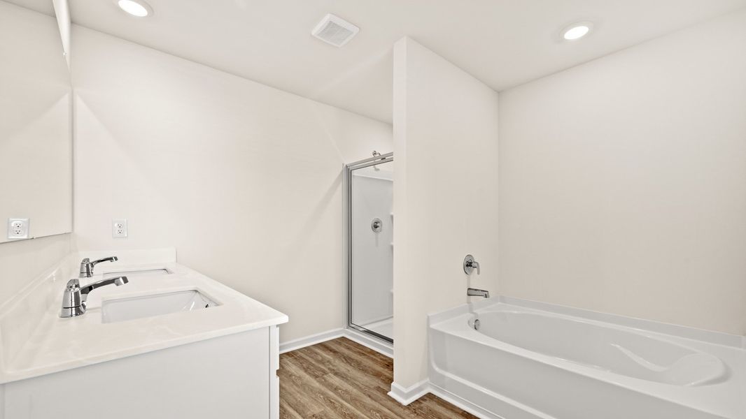 Representative furnished interior of a home built from the Flora by D.R. Horton in Poplar Preserve, Newnan (Image 8).