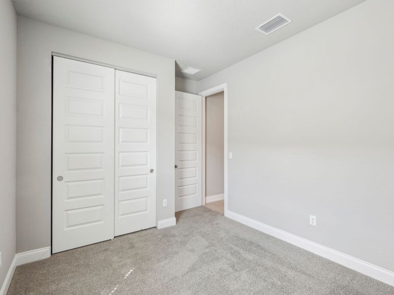Spacious, unfurnished interior of a new home in Brystol at Wylder - Reserve Series, Port St. Lucie (Image 18).