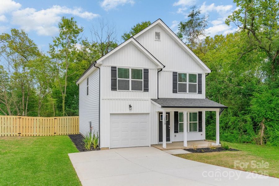 Front exterior of a new home in , Mount Holly, NC, highlighting curb appeal (Image 16).