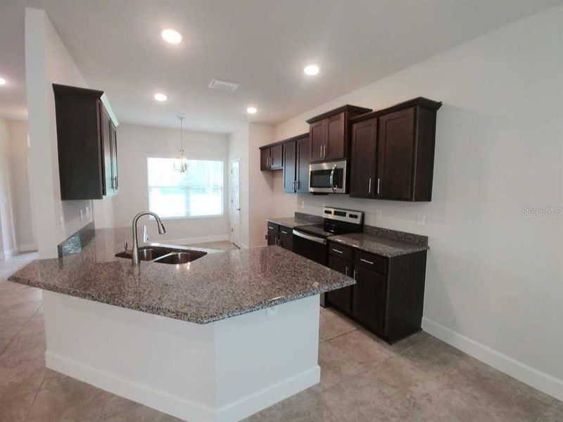Furnished interior view inside a new home in Ocala Crossings South, Ocala (Image 7). Furnished interior view inside a new home in Ocala Crossings South, Ocala (Image 7).