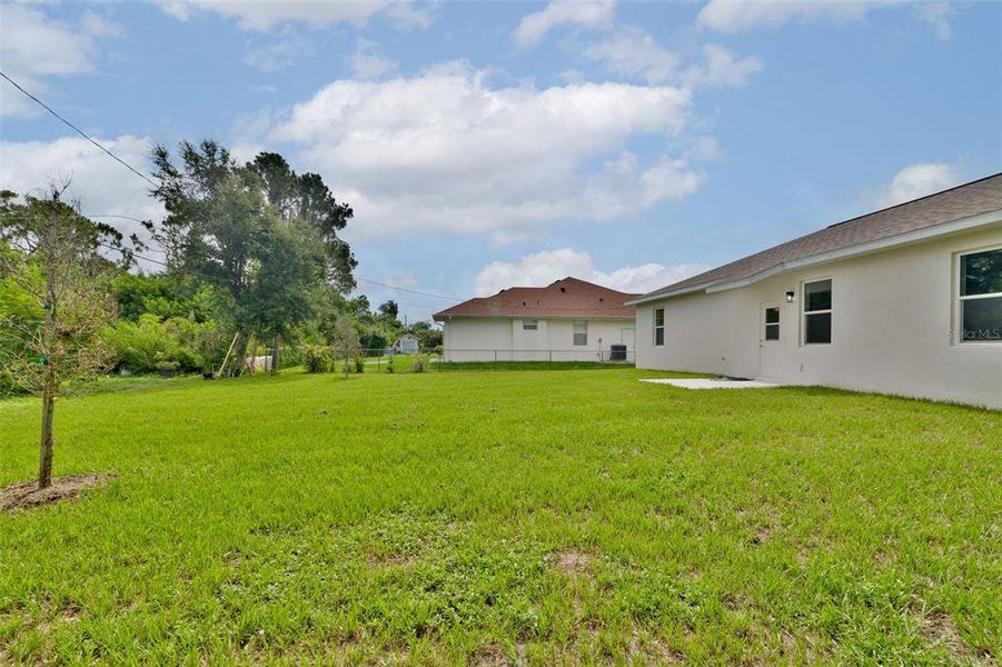 Exterior details and patio area of a home in , North Port (Image 21).