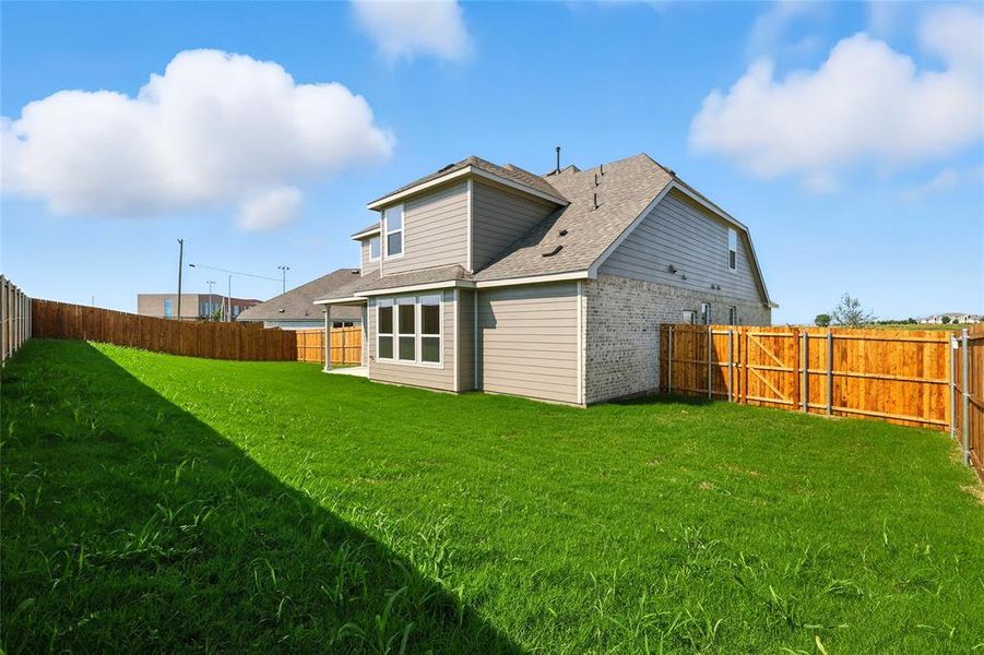 Exterior details and patio area of a home in Pebblebrook, Sherman (Image 20).