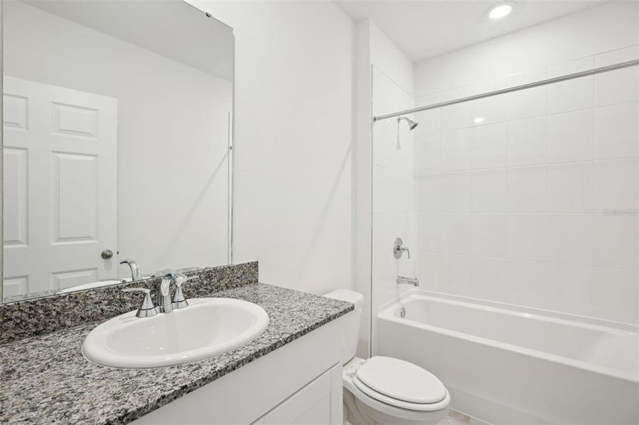 Furnished interior view inside a new home in Villamar - Signature Series, Winter Haven (Image 9).