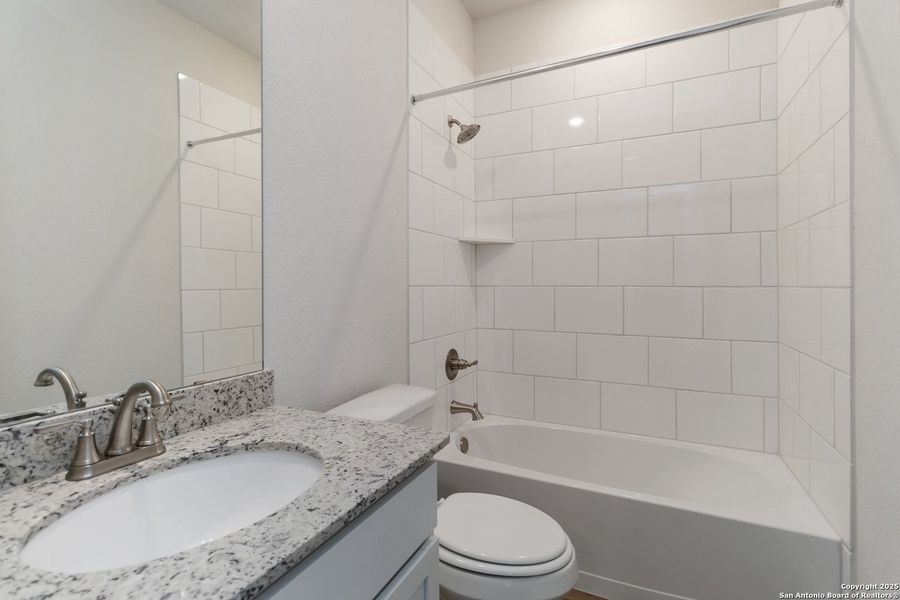 Furnished interior view inside a new home in Hickory Ridge, Elmendorf (Image 8).