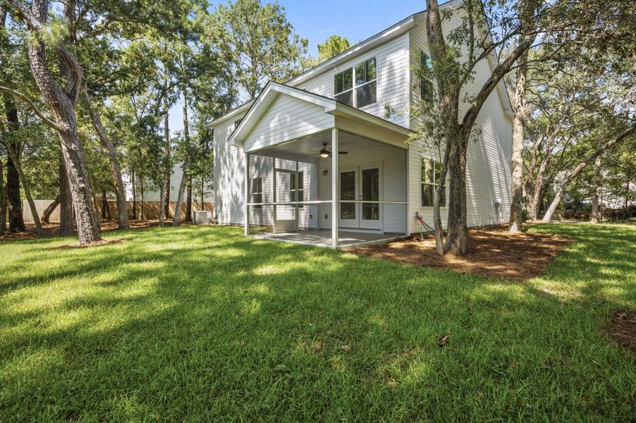 Exterior details and patio area of a home in , Johns Island (Image 17).