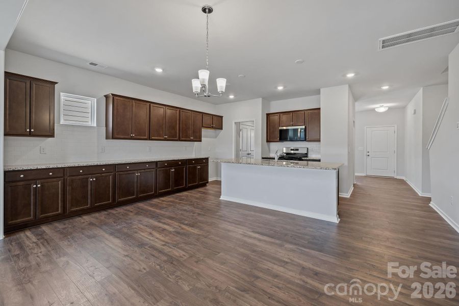 Furnished interior view inside a new home in McFarland Estates, York (Image 8).