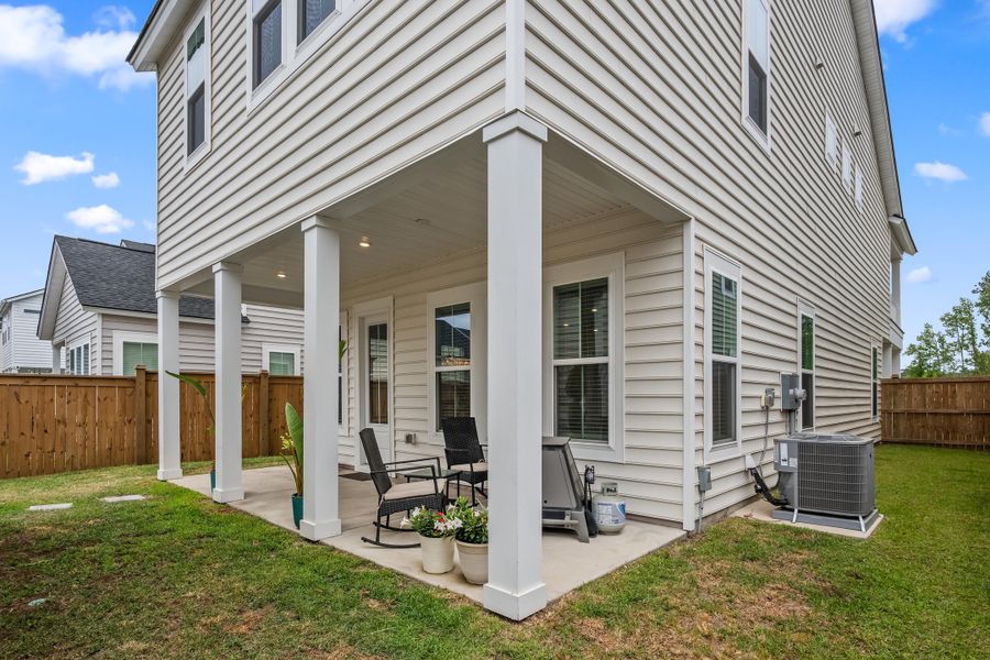 Exterior details and patio area of a home in Sweetgrass at Summers Corner, Summerville (Image 3).