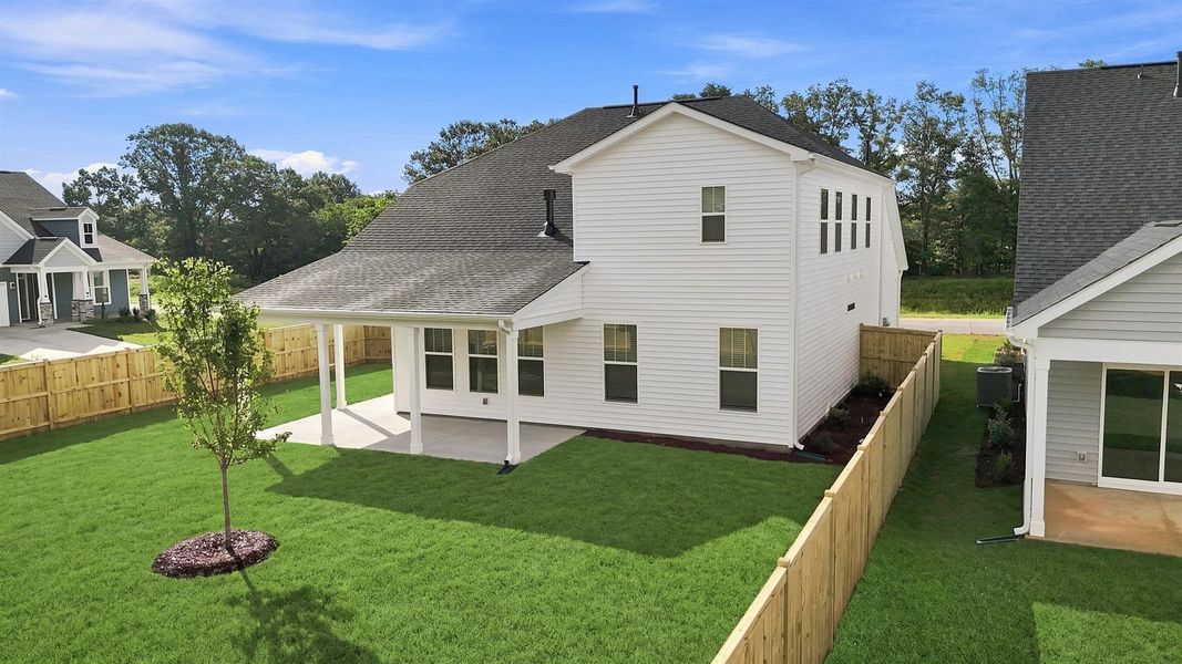 Established charm meets functional outdoor living with a spacious rear covered porch at Walnut Ridge