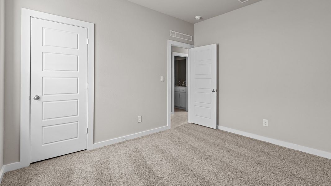Representative unfurnished interior of a home built from the Jaxson by D.R. Horton in Legacy South, Midland (Image 28).