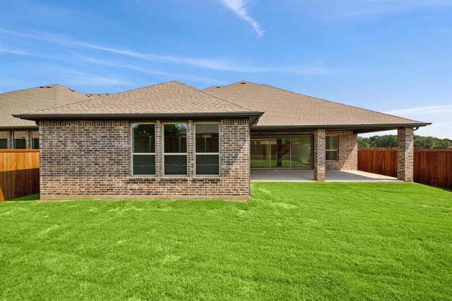 Front exterior of a new home in Sterling Greene, Arlington, TX, highlighting curb appeal (Image 21). Front exterior of a new home in Sterling Greene, Arlington, TX, highlighting curb appeal (Image 21).