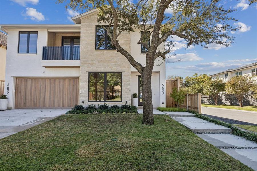 Front exterior of a new home in , Dallas, TX, highlighting curb appeal (Image 1).