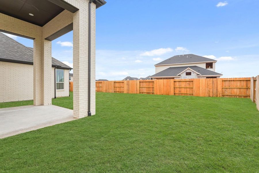 Exterior details and patio area of a home in Grange, Katy (Image 2).