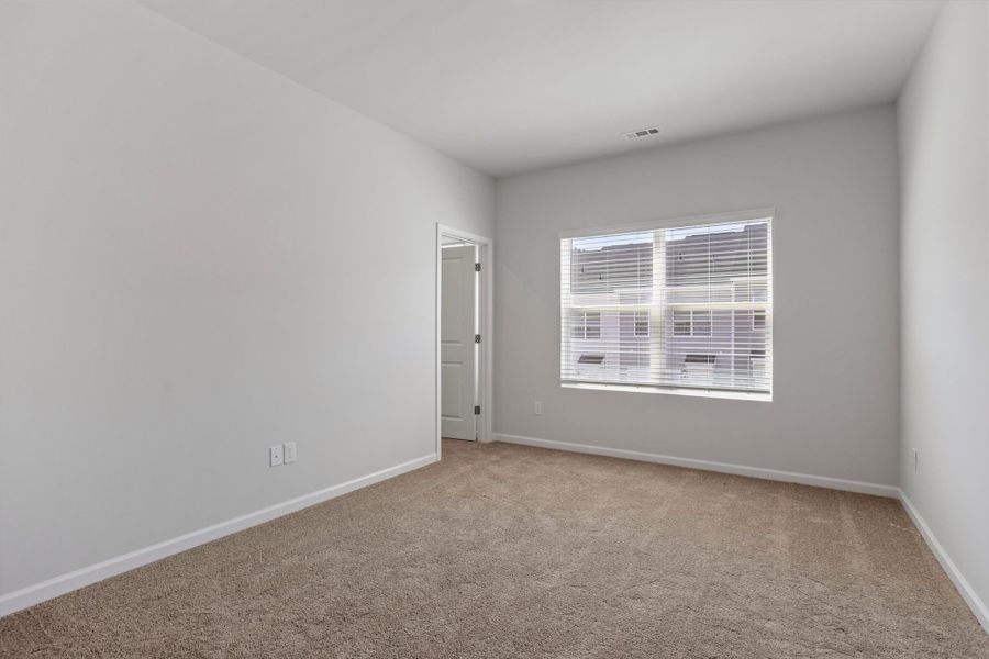 Spacious, unfurnished interior of a new home in Renaissance at White Oak, Garner (Image 17).