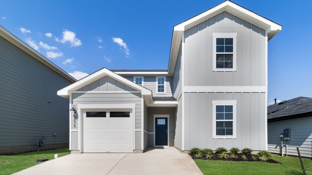 Representative exterior photo of a completed home built from the The Periwinkle by D.R. Horton in Marigold, Kyle, TX (Image 1). Representative exterior photo of a completed home built from the The Periwinkle by D.R. Horton in Marigold, Kyle, TX (Image 1).