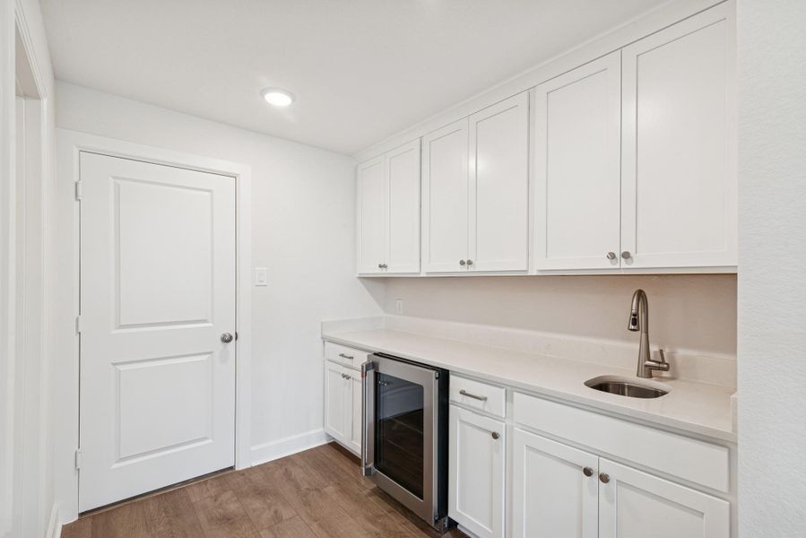 Furnished interior view inside a new home in The Highlands 55' - Encore Collection, Porter (Image 10).