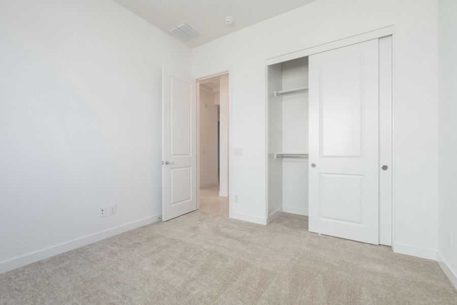 Spacious, unfurnished interior of a new home in Waterston Central, Gilbert (Image 13).