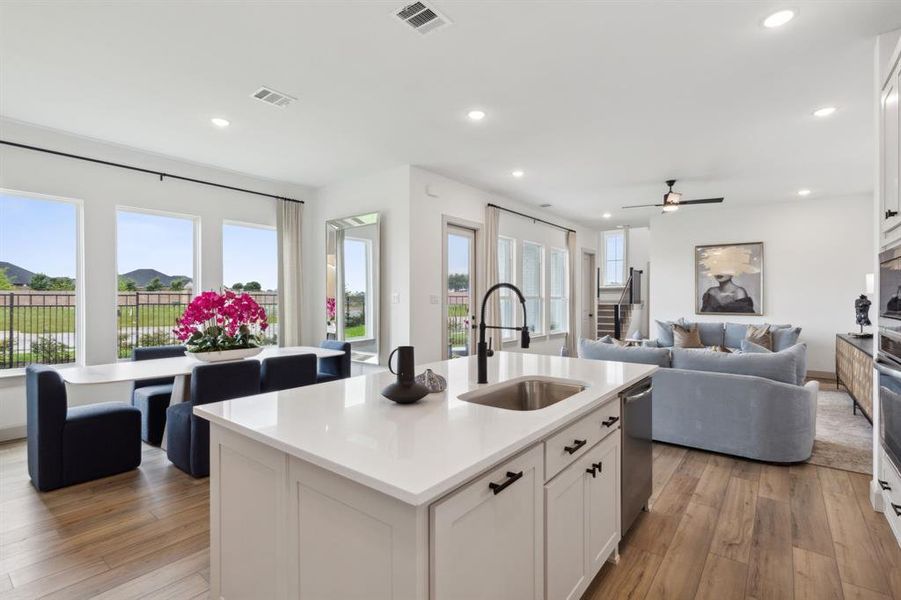 With the kitchen open to the dining and family rooms, the chef in the family will never be left out of the party!