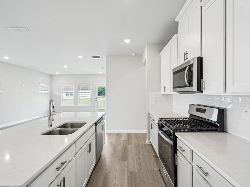Furnished interior view inside a new home in Hawthorne Station, College Park (Image 7).